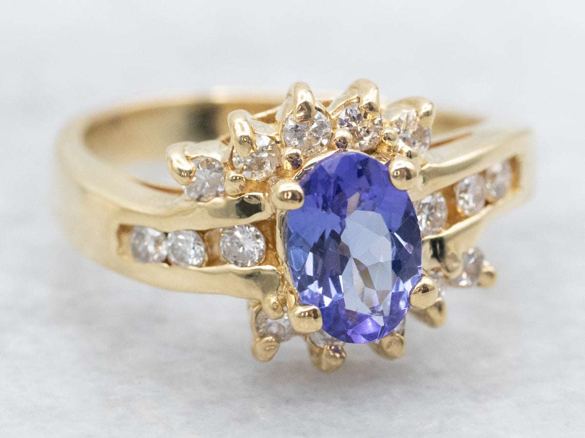 Modern Tanzanite and Diamond Halo Ring