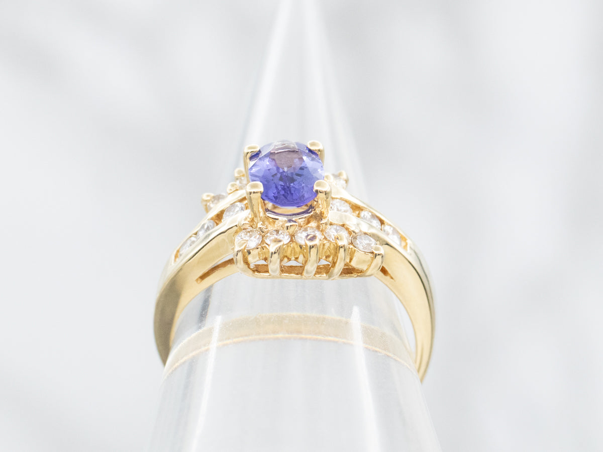 Modern Tanzanite and Diamond Halo Ring