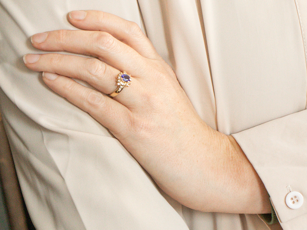 Modern Tanzanite and Diamond Halo Ring