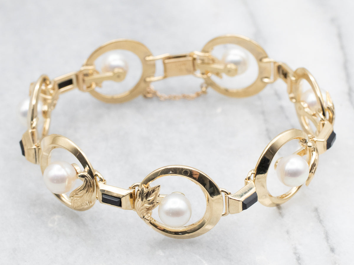 White Pearl and Black Onyx Gold Botanical Link Bracelet