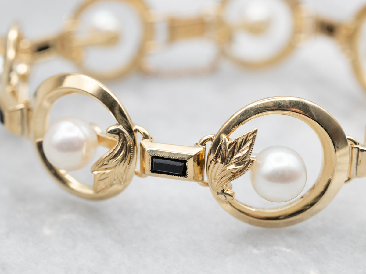 White Pearl and Black Onyx Gold Botanical Link Bracelet