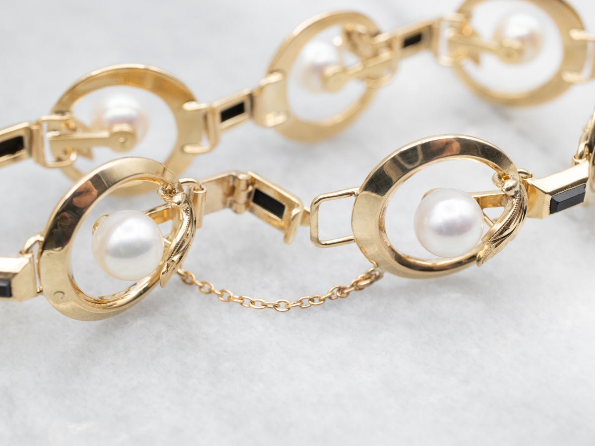 White Pearl and Black Onyx Gold Botanical Link Bracelet