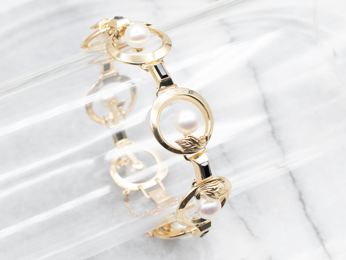 White Pearl and Black Onyx Gold Botanical Link Bracelet