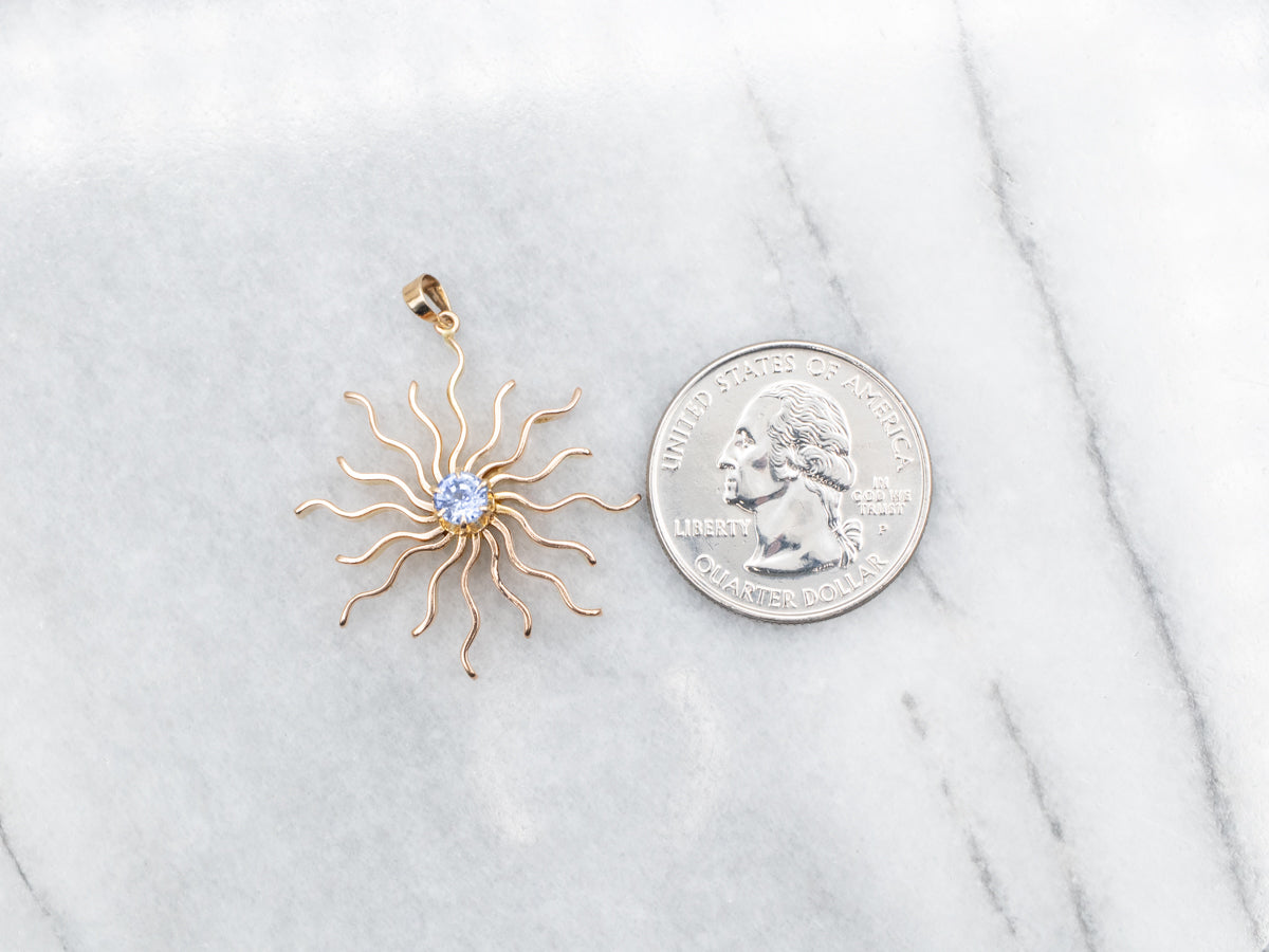 Scrolling Gold Sapphire Sunburst Pendant