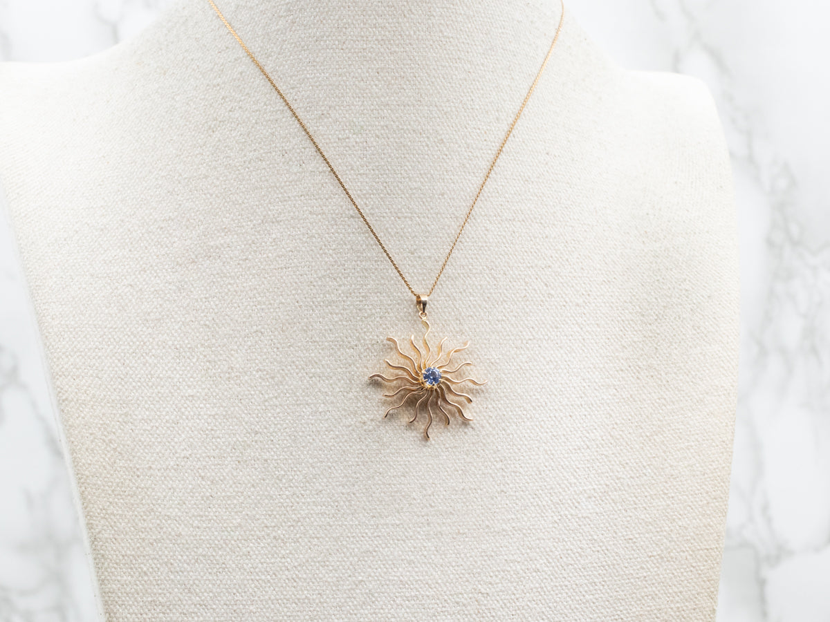 Scrolling Gold Sapphire Sunburst Pendant