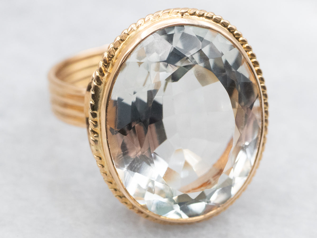 Bezel-Set 18-Karat Gold Blue Topaz Cocktail Ring