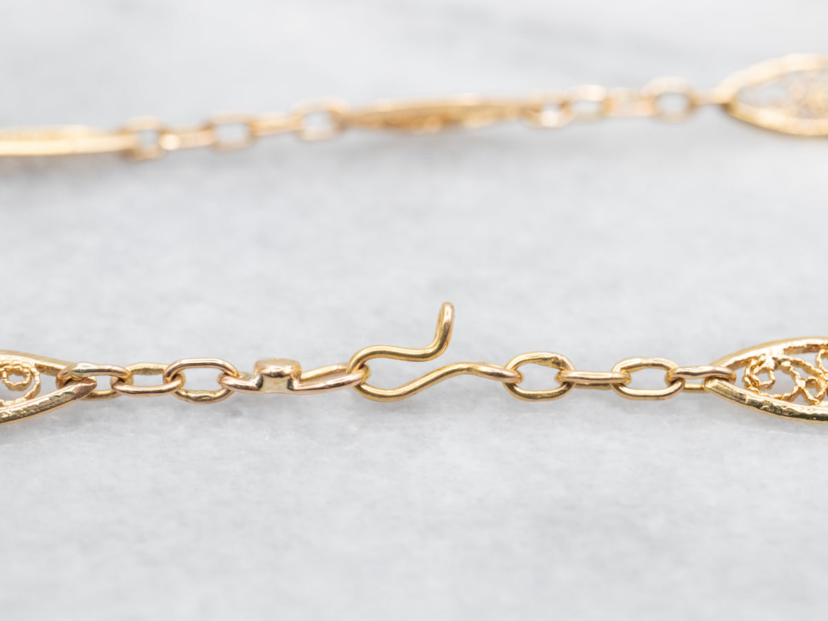 Long Scrolling Gold Filigree Link Chain