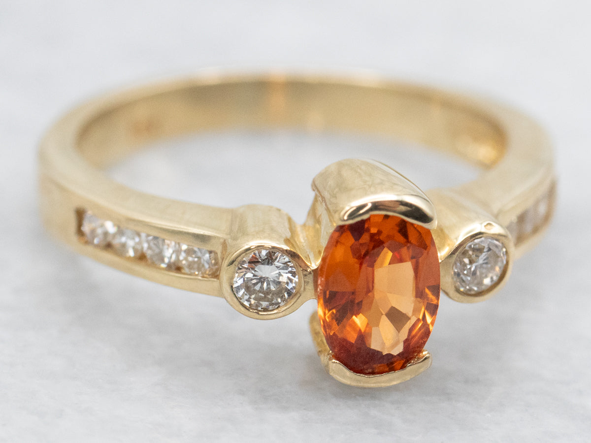 Tension Set Spessartine Garnet and Diamond Ring