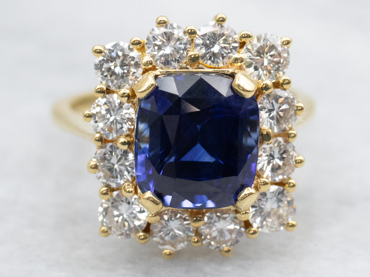 Contemporary Benchmark Quality Sapphire and Diamond Halo Ring