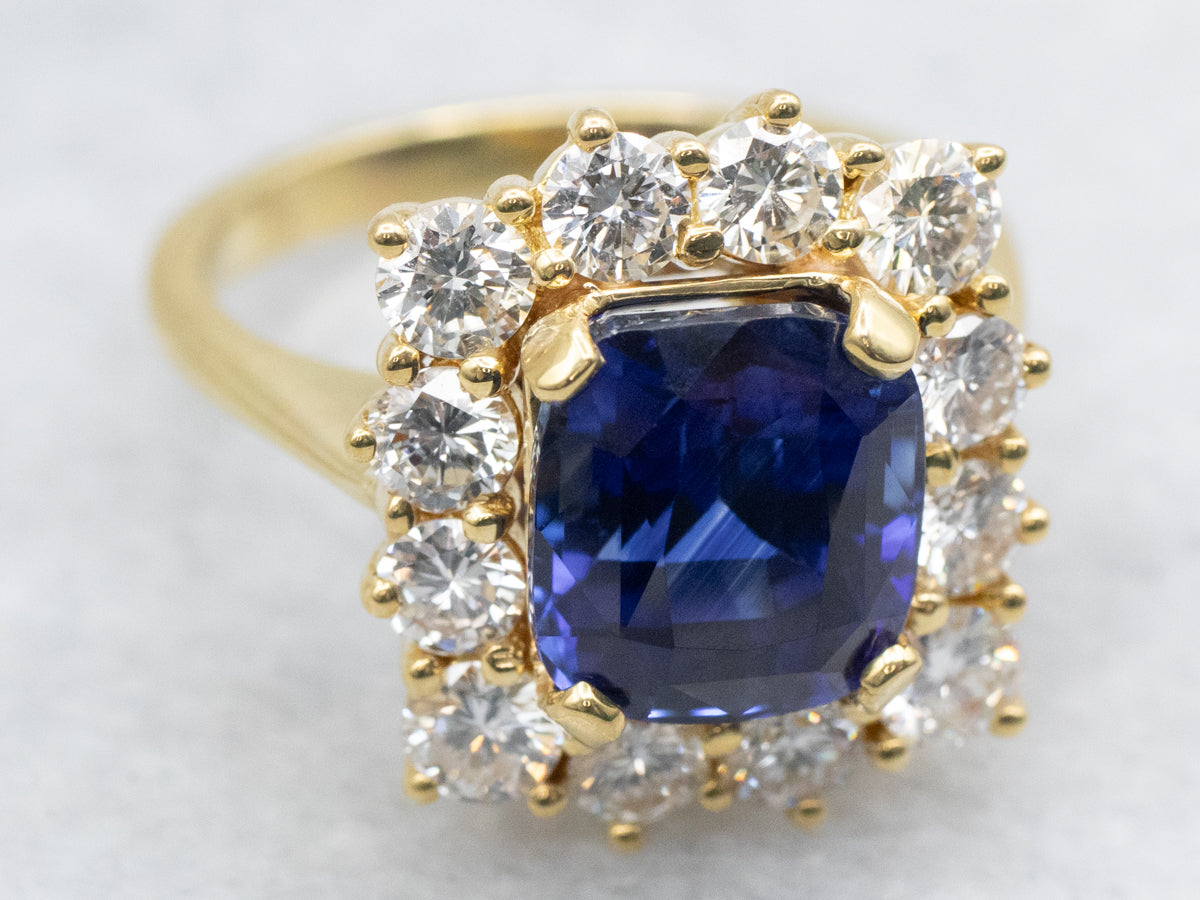 Contemporary Benchmark Quality Sapphire and Diamond Halo Ring