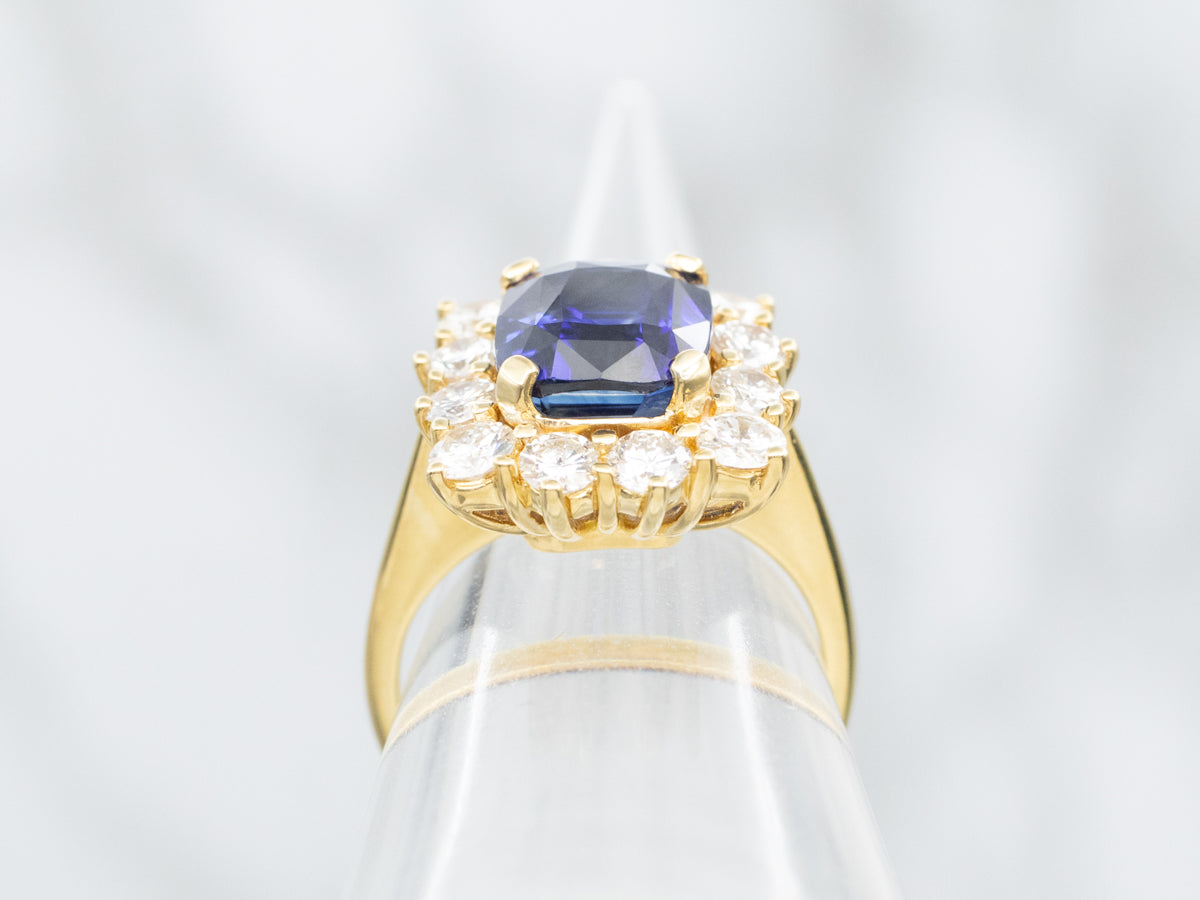 Contemporary Benchmark Quality Sapphire and Diamond Halo Ring