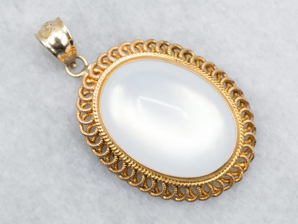 Mother of Pearl Pendant in Looping Gold Frame
