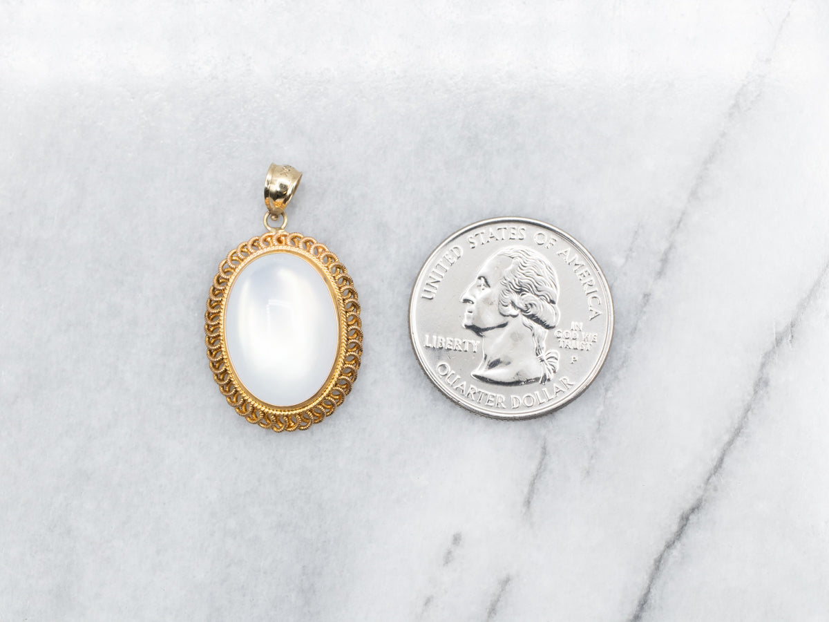 Mother of Pearl Pendant in Looping Gold Frame