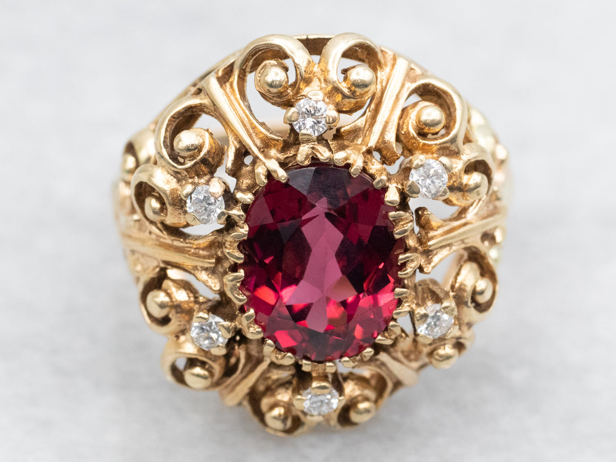 Ornate Gold and Garnet and Diamond Scrolling Halo Ring