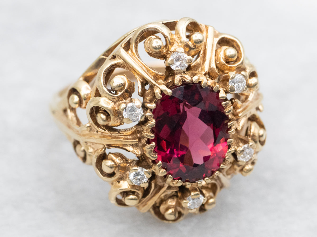 Ornate Gold and Garnet and Diamond Scrolling Halo Ring