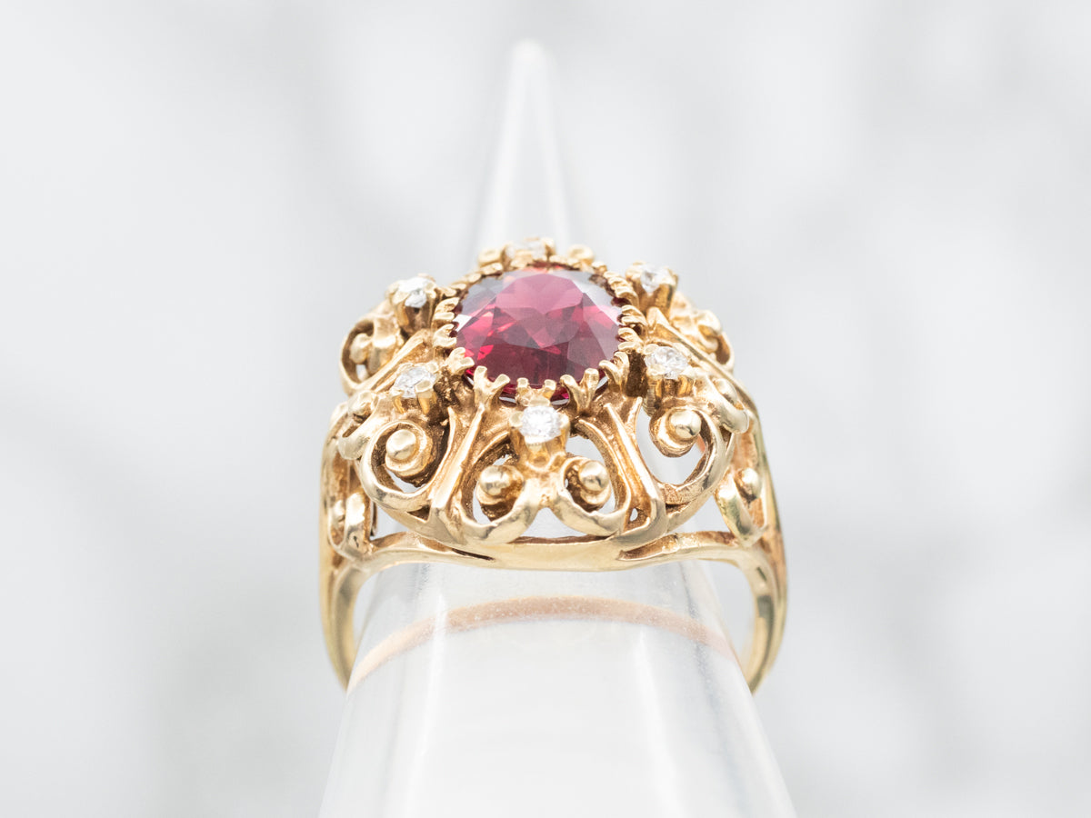 Ornate Gold and Garnet and Diamond Scrolling Halo Ring