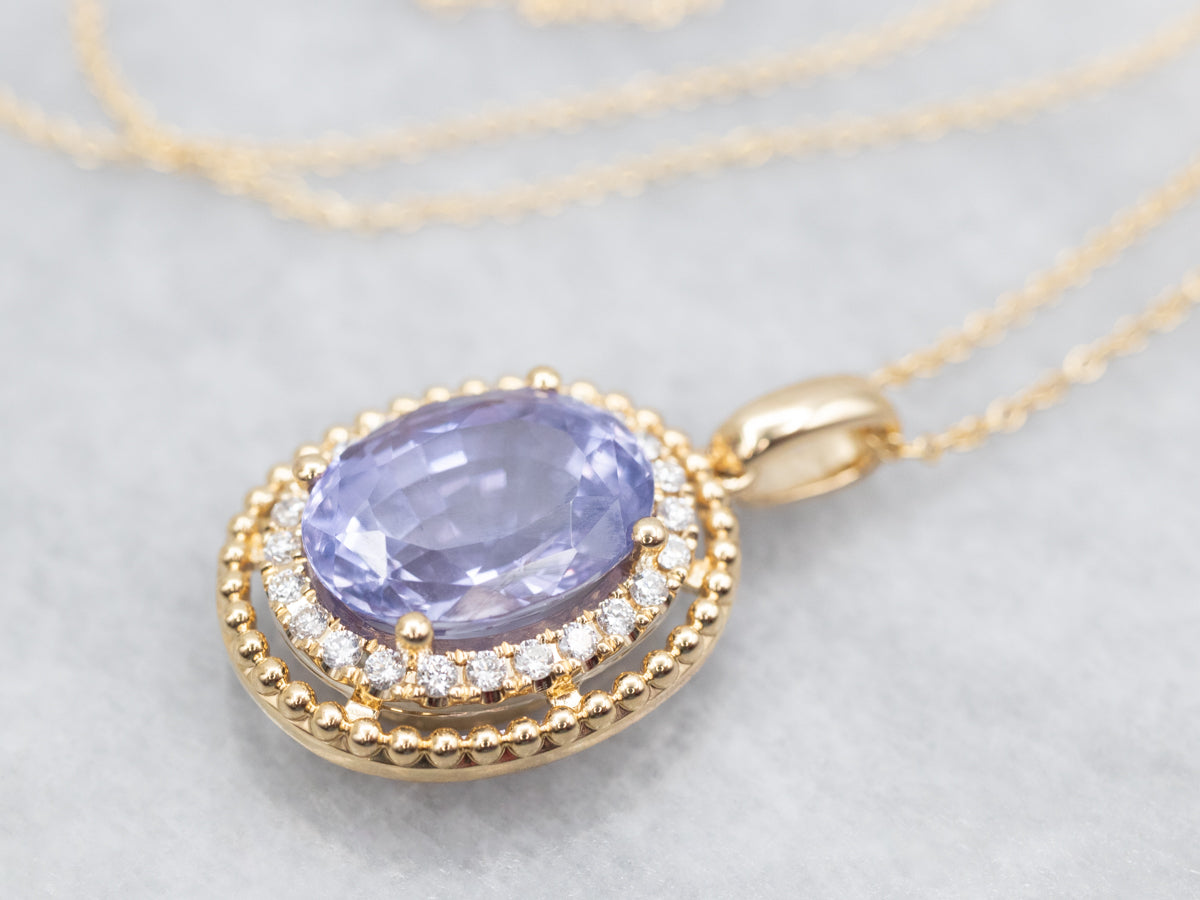 Modern Gold Sapphire Halo Pendant Necklace
