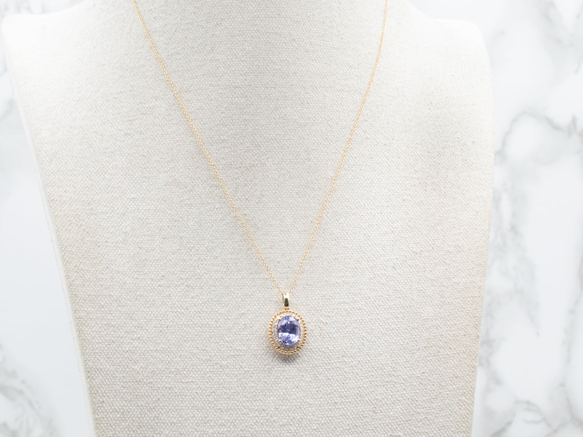 Modern Gold Sapphire Halo Pendant Necklace