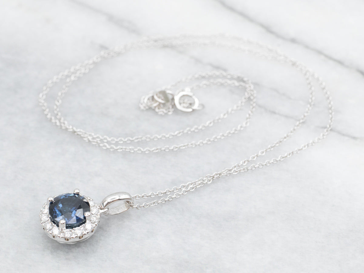 Sapphire and Diamond Halo Pendant Necklace