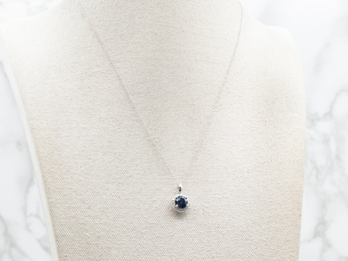 Sapphire and Diamond Halo Pendant Necklace