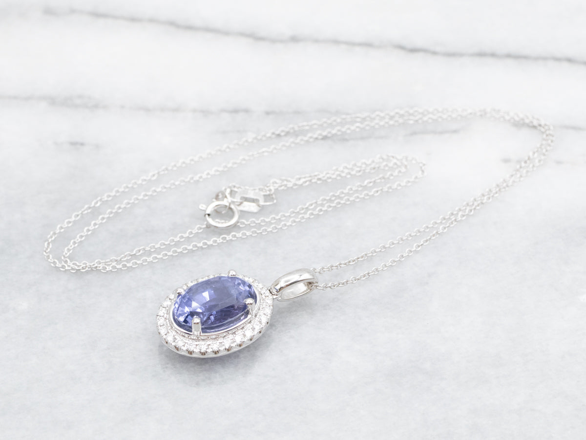 Modern Sapphire Halo Pendant Necklace