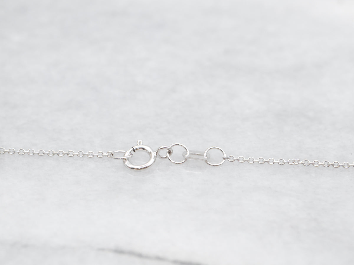 Modern Sapphire Halo Pendant Necklace