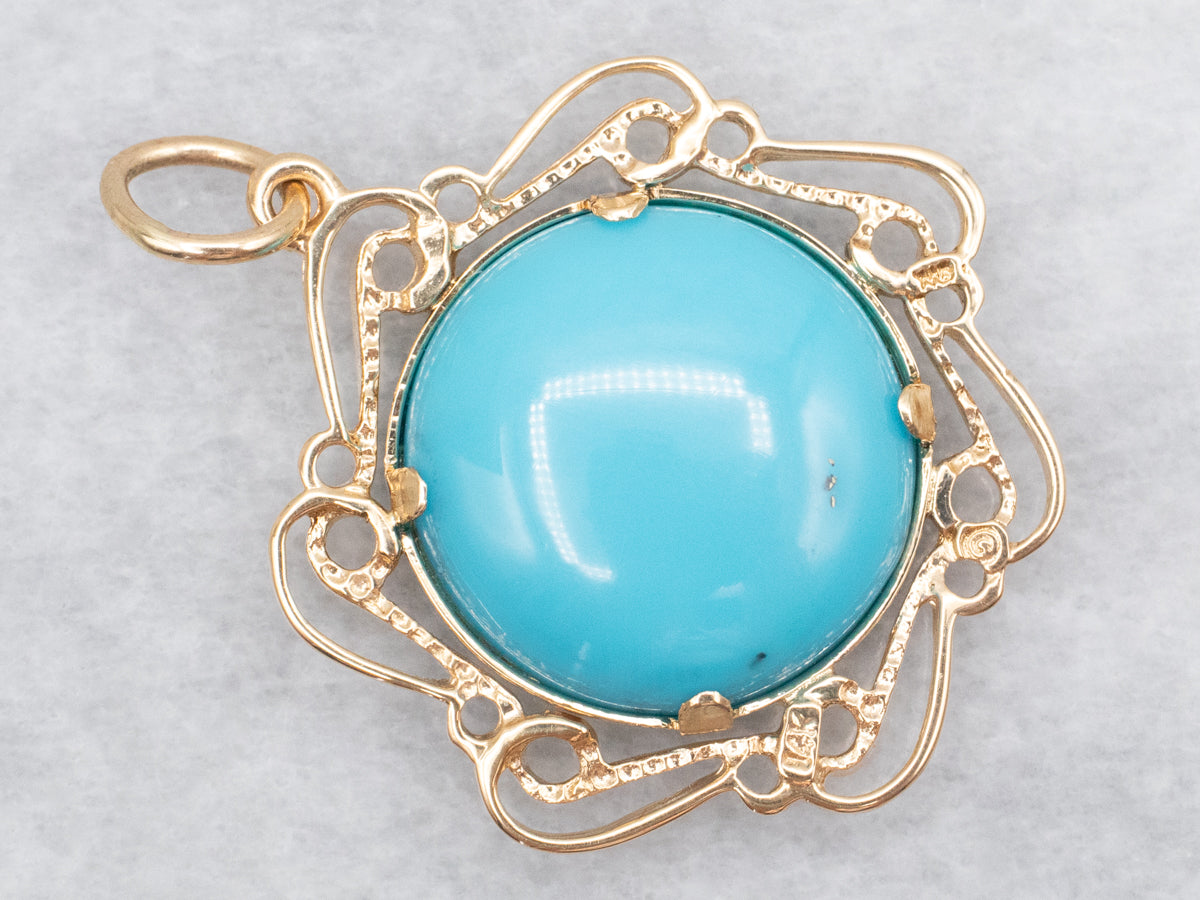 Turquoise and Gold Pendant in Scrolling Frame