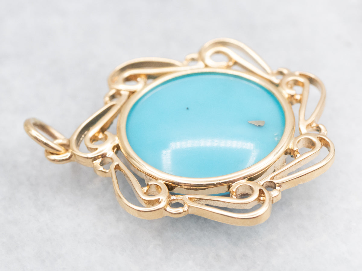 Turquoise and Gold Pendant in Scrolling Frame