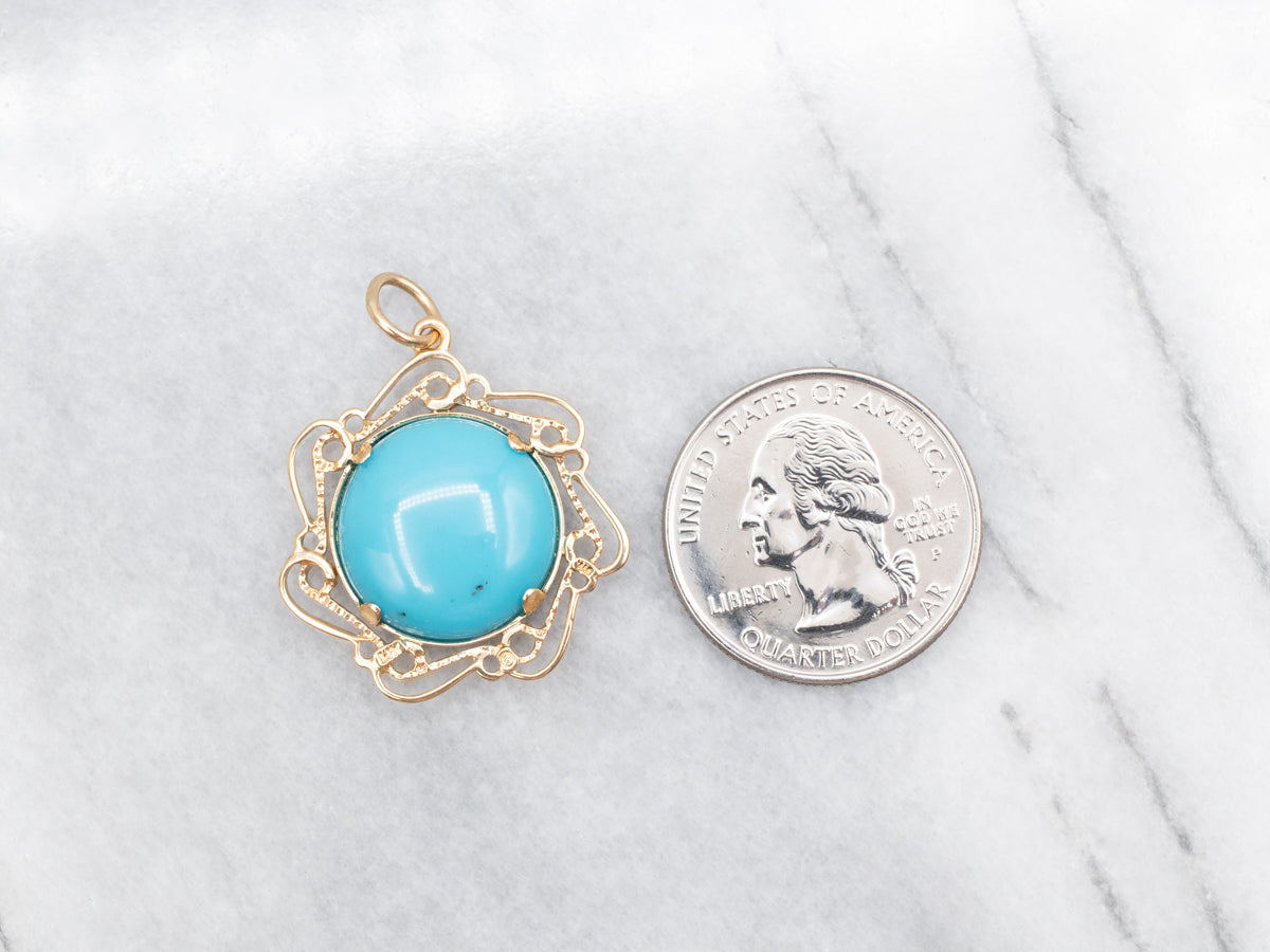 Turquoise and Gold Pendant in Scrolling Frame