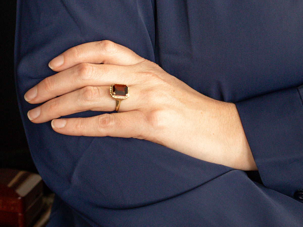 Patterned Frame Garnet Solitaire Ring