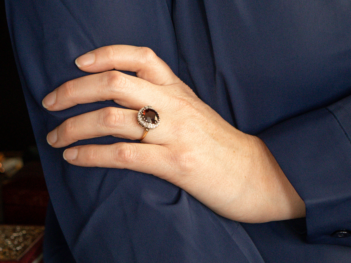 Claw Prong Garnet and Diamond Halo Ring
