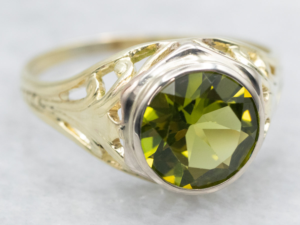 Bezel Set Peridot Ring with Openwork Shank
