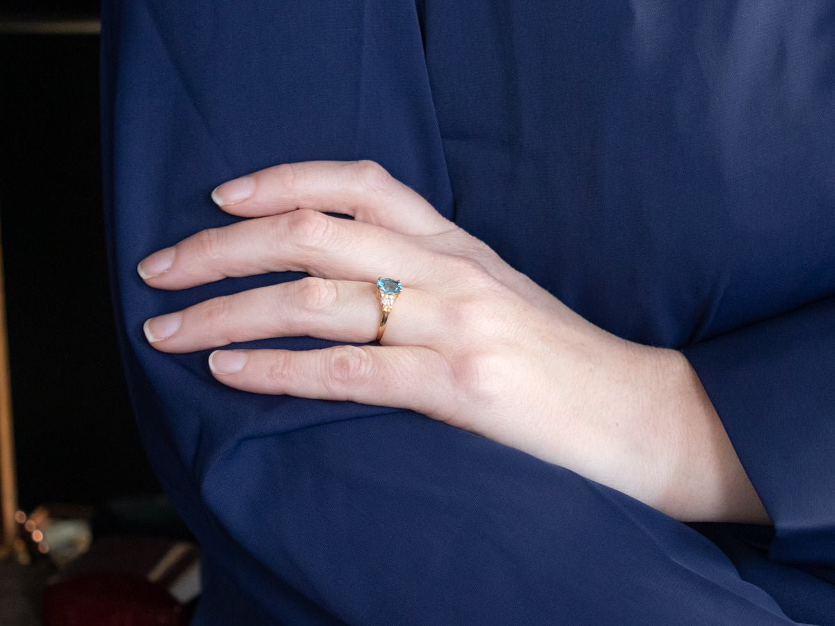 Modern Blue Topaz and Diamond Ring