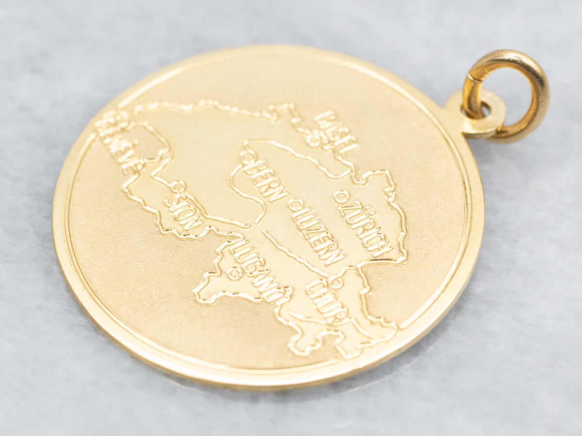18-Karat Gold "SWITZERLAND" Disc Pendant