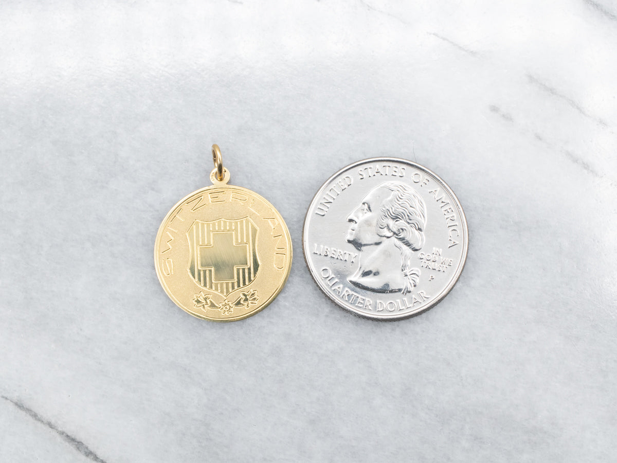 18-Karat Gold "SWITZERLAND" Disc Pendant