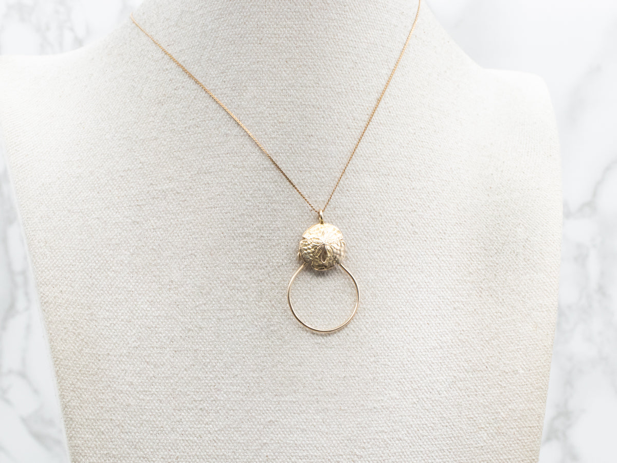 Gold Sand Dollar Charm Holder