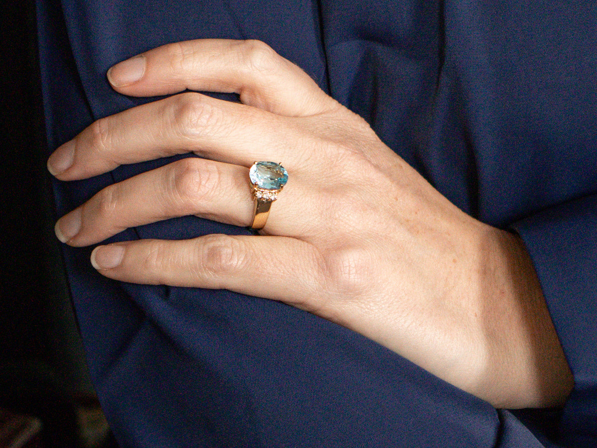 Modern Gold Blue Topaz and Diamond Ring