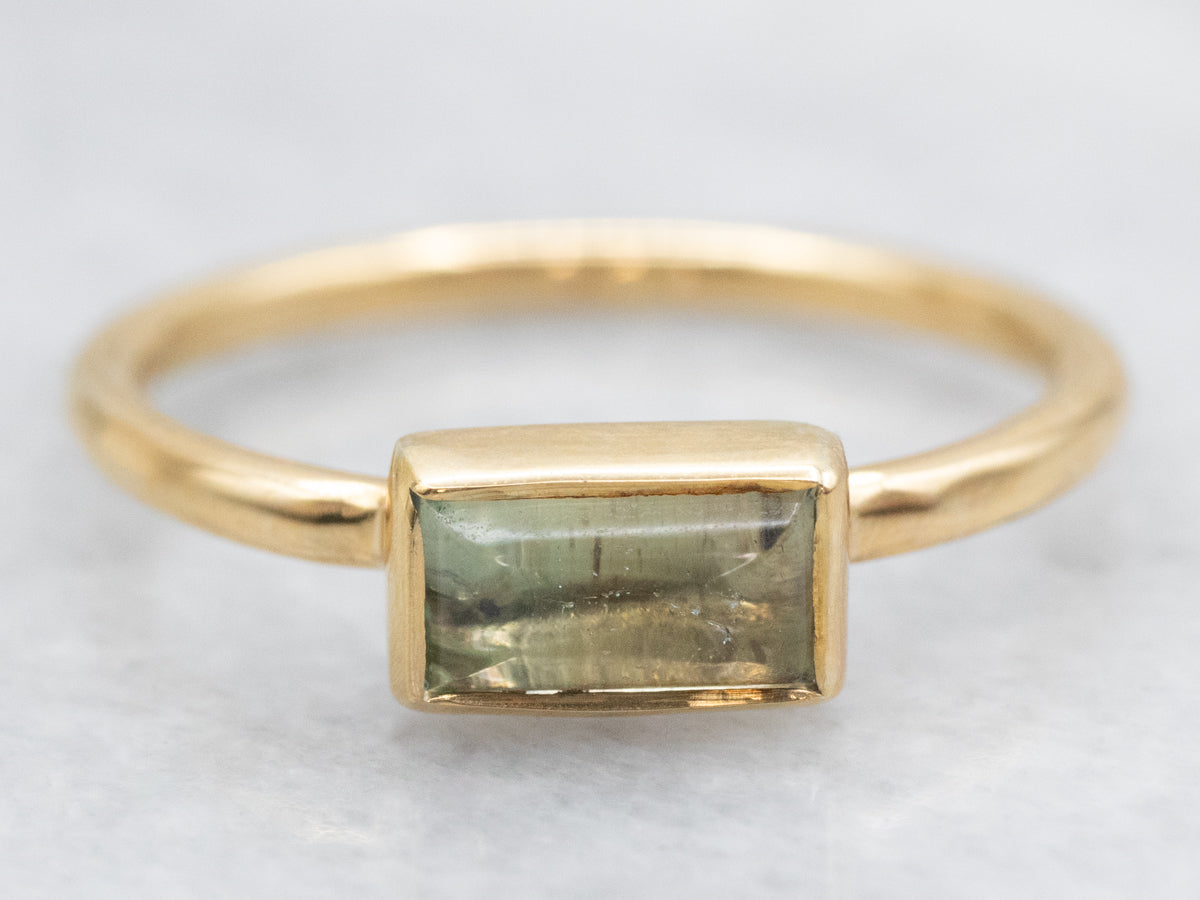 Bezel Set East to West Set Aquamarine Solitaire Ring