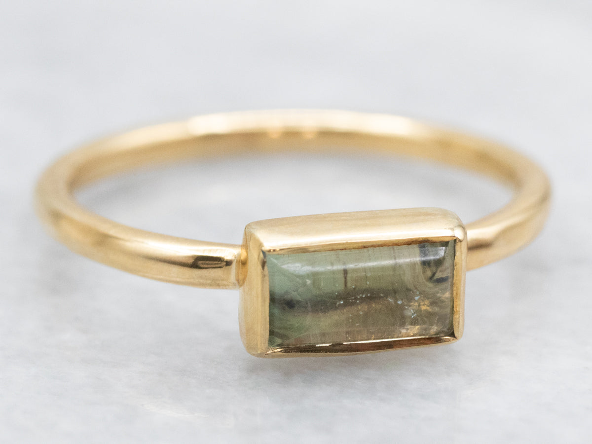 Bezel Set East to West Set Aquamarine Solitaire Ring