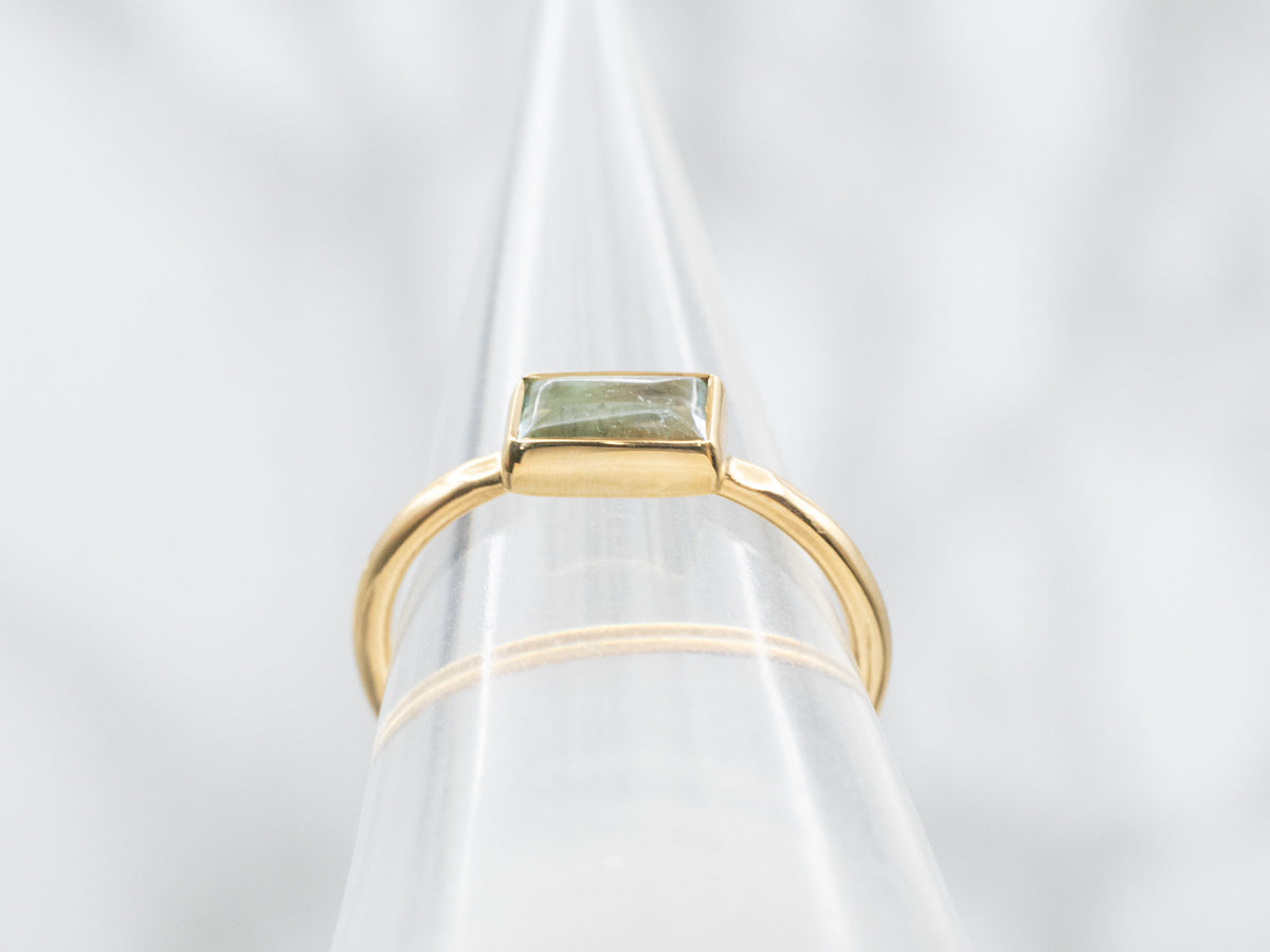 Bezel Set East to West Set Aquamarine Solitaire Ring