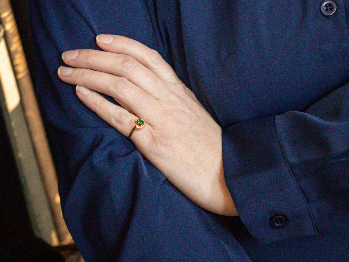 Modernist Gold Emerald Solitaire Swirl Ring