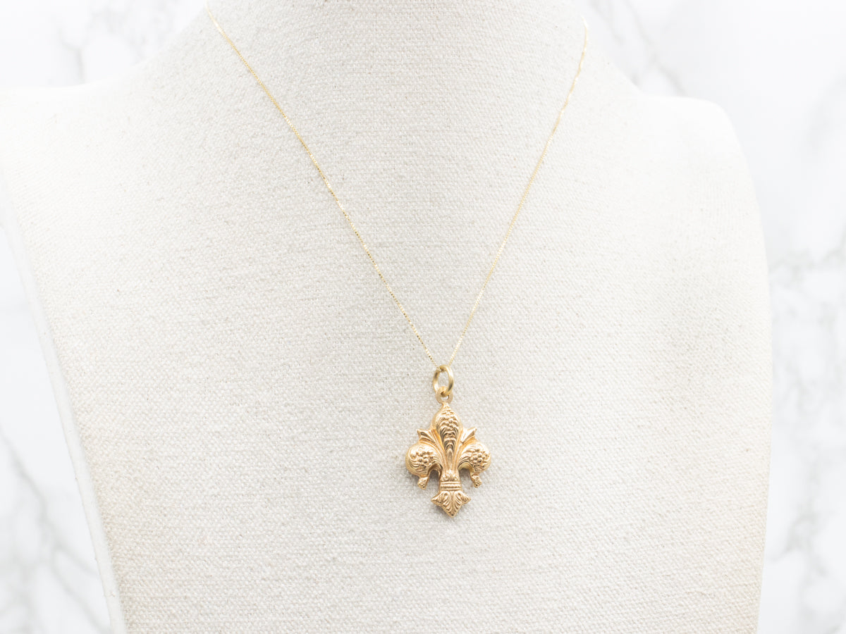 Vintage Ornate Puffy Fleur de Lis Pendant
