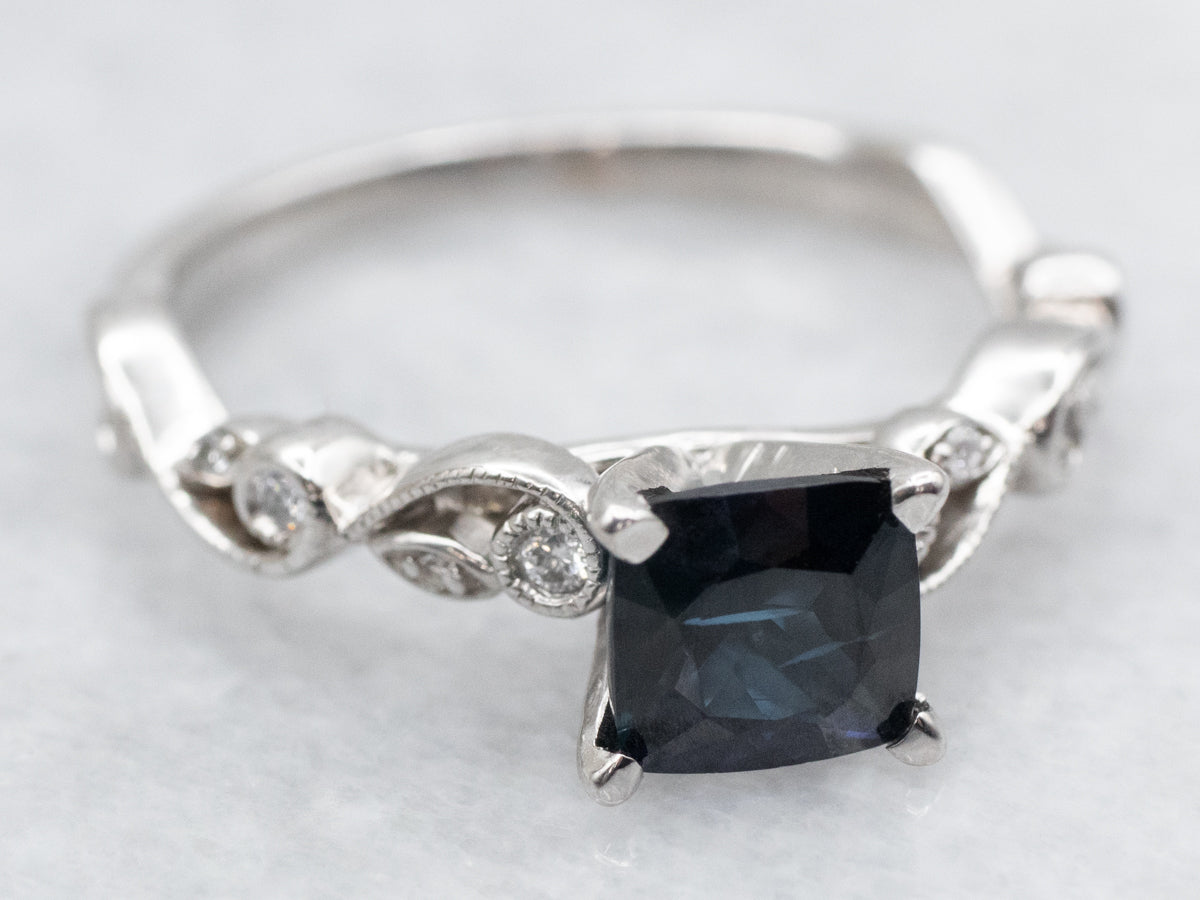 Pretty Sapphire and Diamond Engagement Ring with Swirl Shoulders