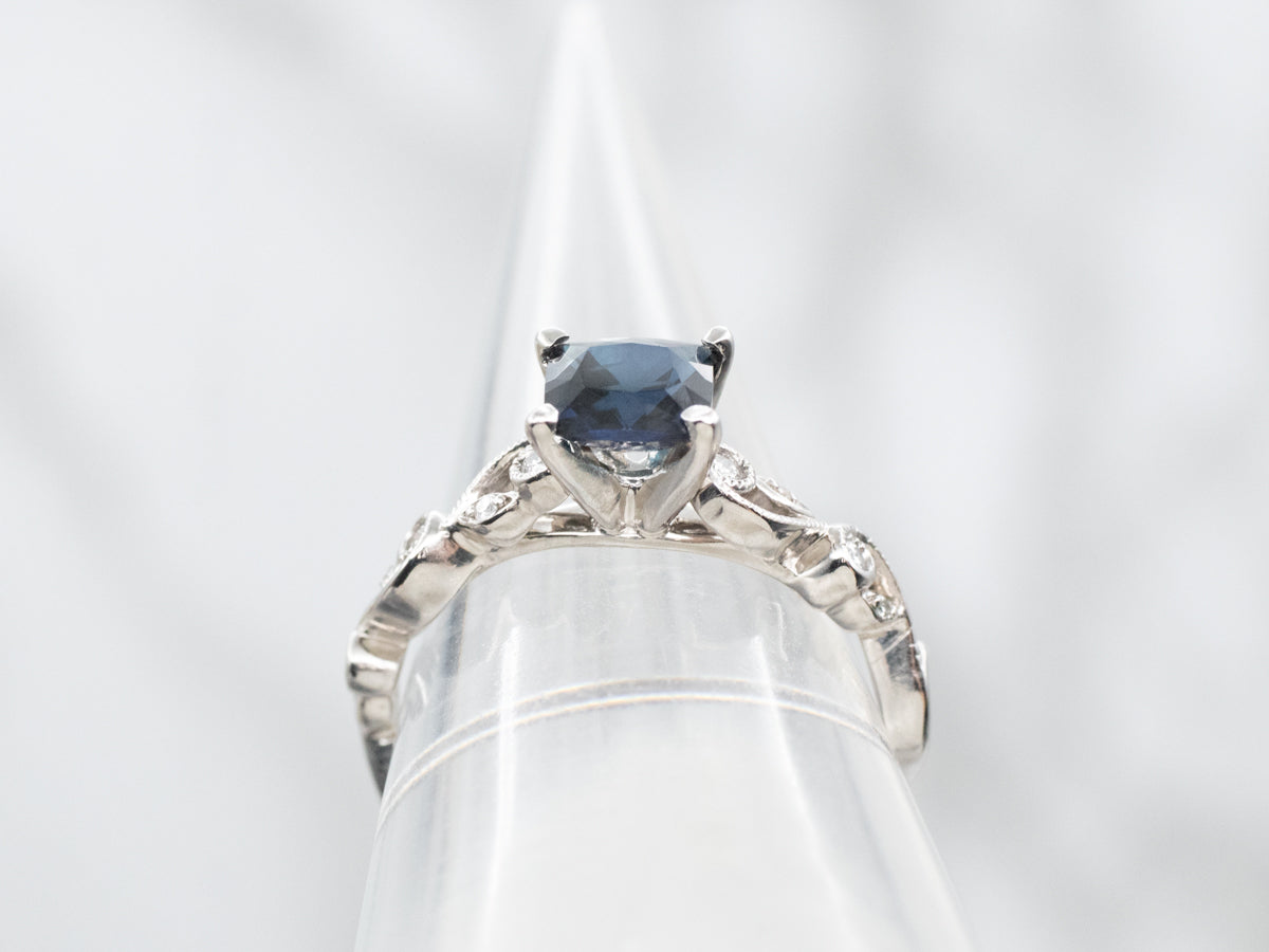 Pretty Sapphire and Diamond Engagement Ring with Swirl Shoulders