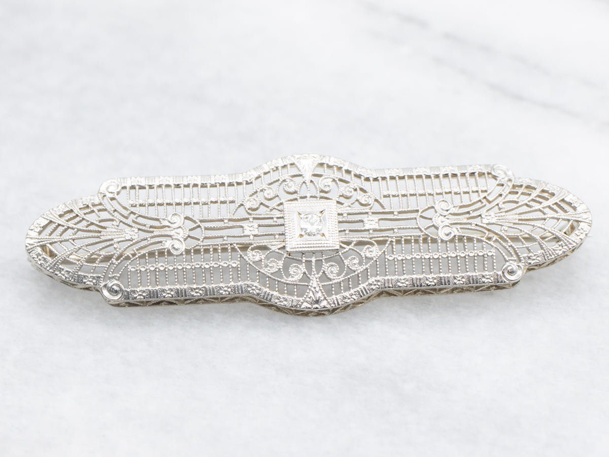 Outstanding Art Deco Filigree Brooch with Diamond Center