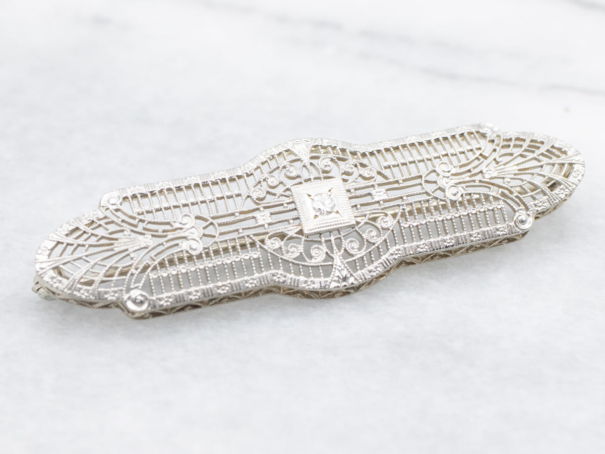 Outstanding Art Deco Filigree Brooch with Diamond Center