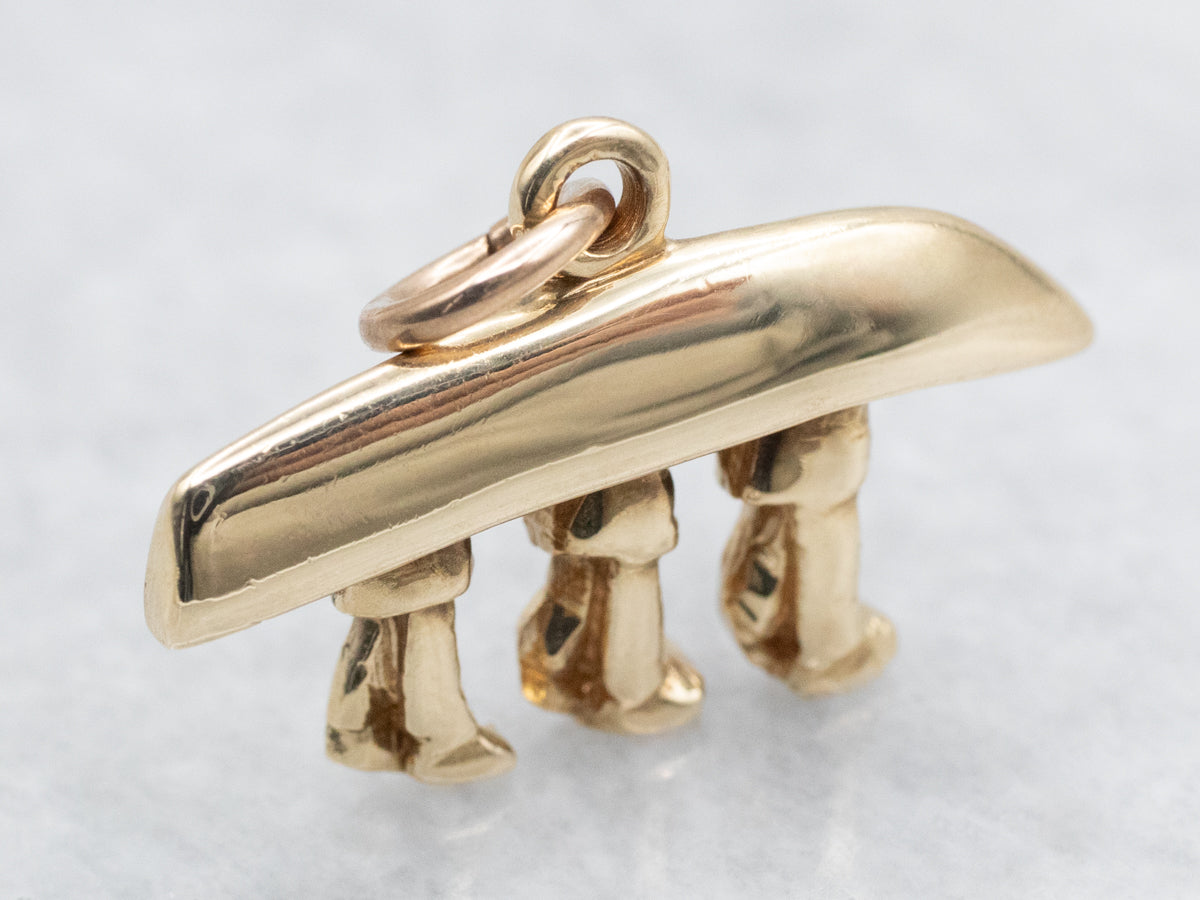 Yellow Gold Canoe Being Carried Pendant