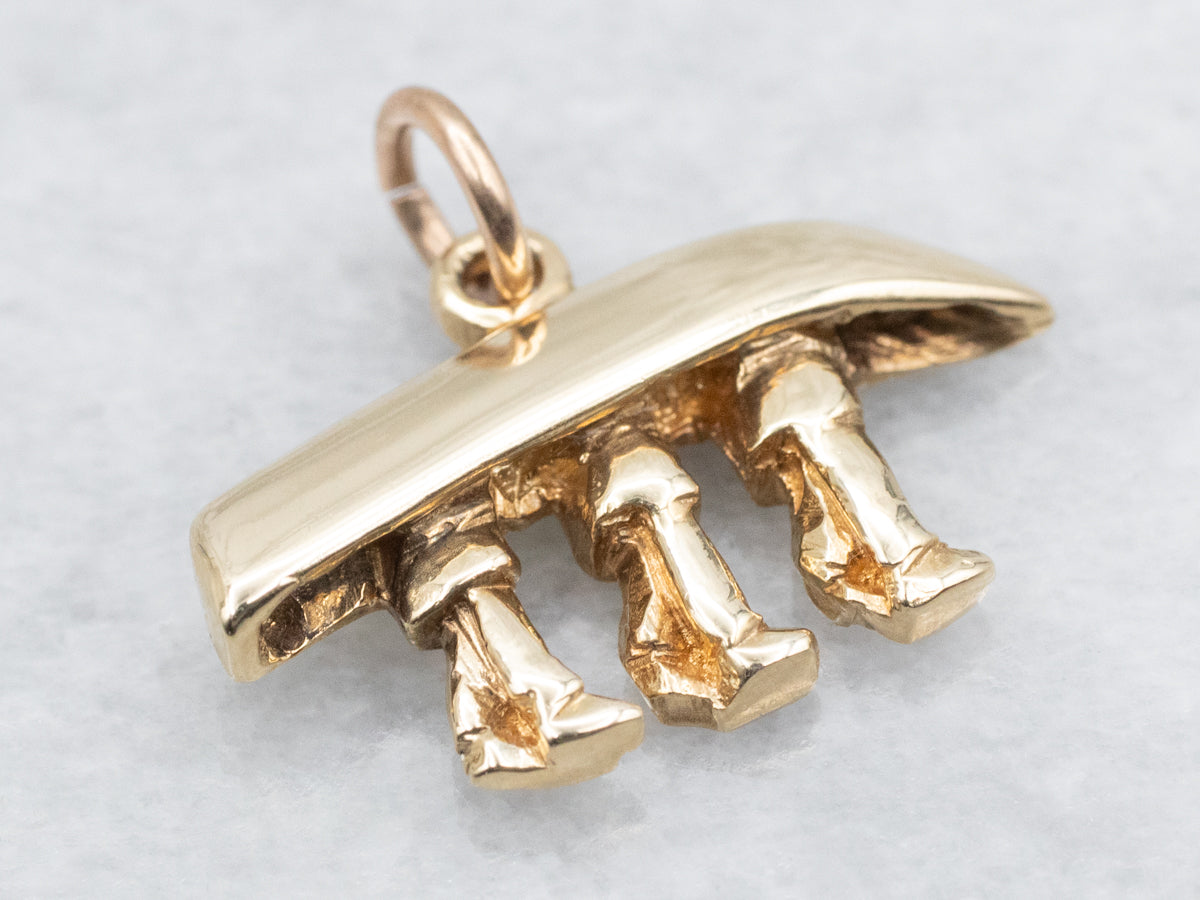Yellow Gold Canoe Being Carried Pendant