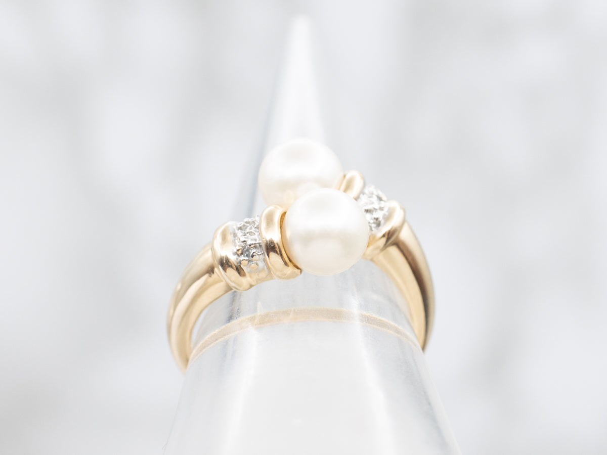 Modern Yellow Gold Pearl and Diamond Bypass Ring