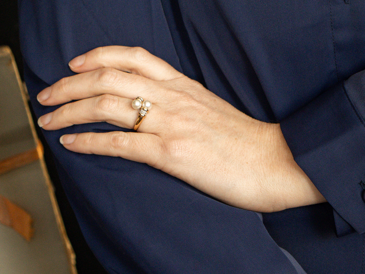 Modern Yellow Gold Pearl and Diamond Bypass Ring
